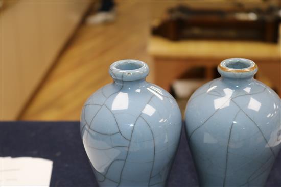 A pair of blue Chinese crackleware vases on stands